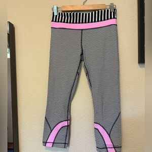 Rare - lululemon SeaWheeze striped capri leggings with pink details.  Size 6.